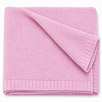 Couverture en tricot vieux rose, pliée, vue produit